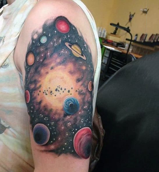 Guy With Magical Universe Tattoo On Upper Arms