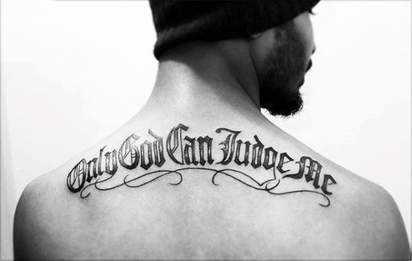 guy with manly only god can judge me upper back shoulder tattoo