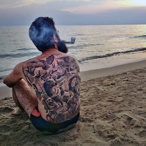 Guy With Muti Horned Unicorn And Bird Tattoo Full Back