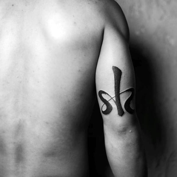 Guy With Outer Arm Tricep Chinese Symbol Tattoo Design