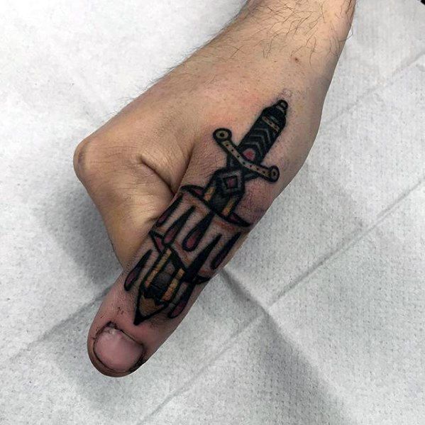 Guy With Pencil Sword Finger Thumb Tattoo Design