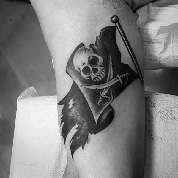Guy With Pirate Flag Black And Grey Ink Tattoo On Inner Arm