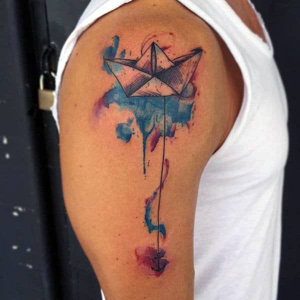 Guy With Quirky Watercolor Tattoo On Arms