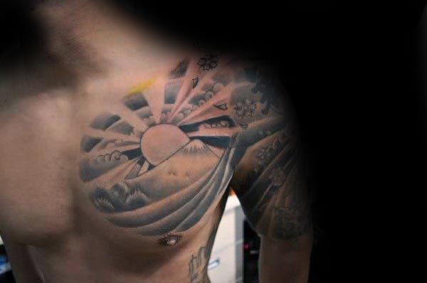 Guy With Rising Sun Mountain Top Chest Tattoo With Shaded Design