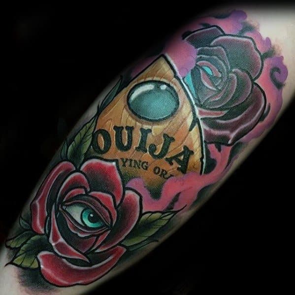 Guy With Rose Flower And Planchette Tattoo Design On Leg