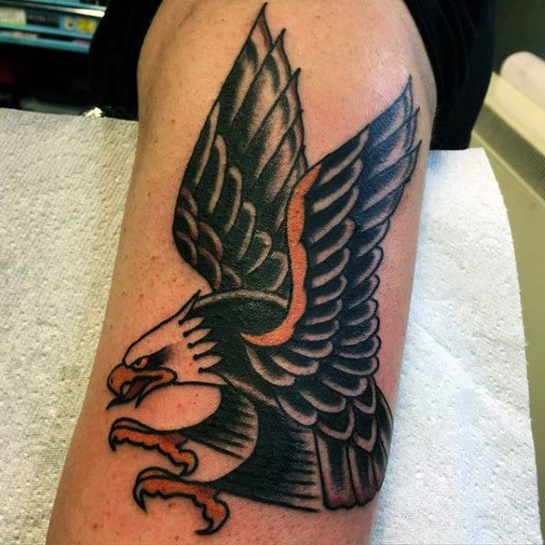 Guy With Rustic Bald Eagle Tattoo On Forearms