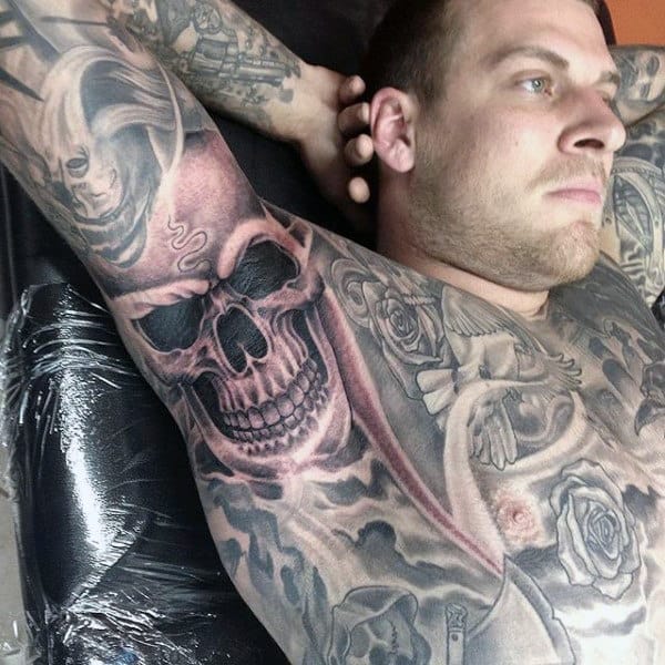 Guy With Rusty Skull Tattoo On Armpits