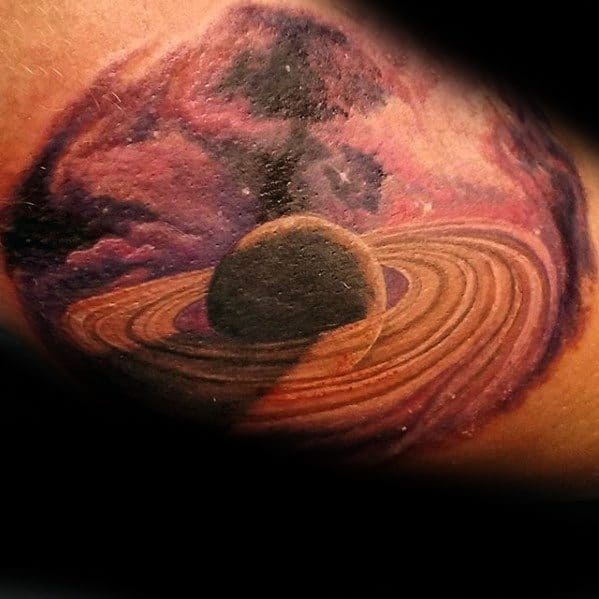 Guy With Saturn Tattoo Design