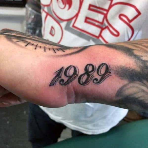 Guy With Side Hand Numbers 1989 Tattoo Design