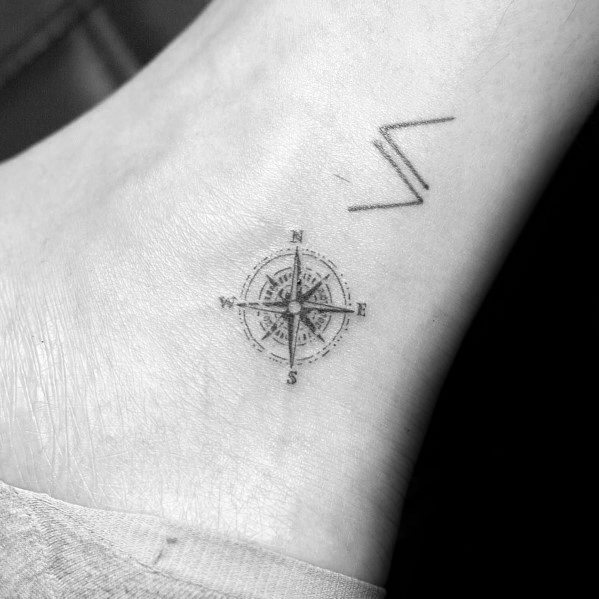 Guy With Simple Compass Ankle Tattoo