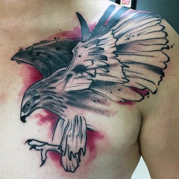 Guy With Simple Pouncing Hawk Chest Tattoo