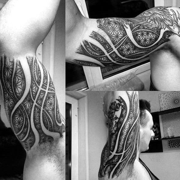 Guy With Spiral Pattern Tattoo On Arms
