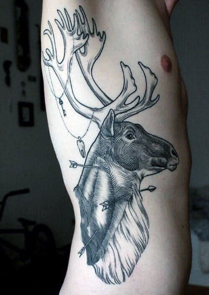 Guy With Tattoos Deer On Ribcage