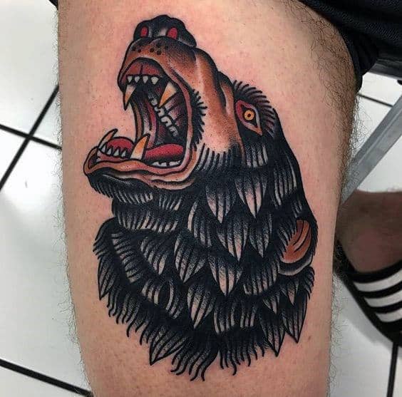 Guy With Traditional Bear Thigh Tattoo Design