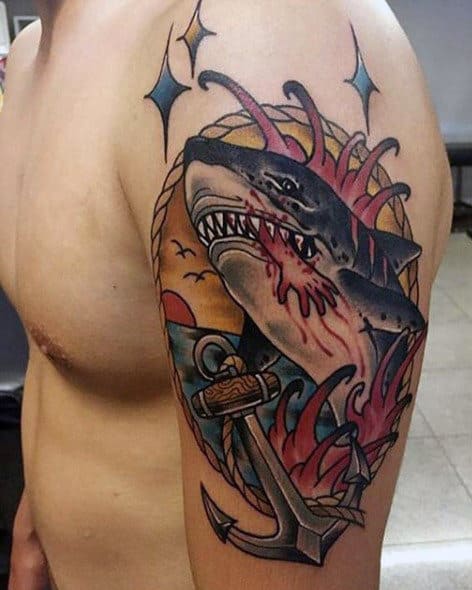Guy With Traditional Shark Tattoos On Arm