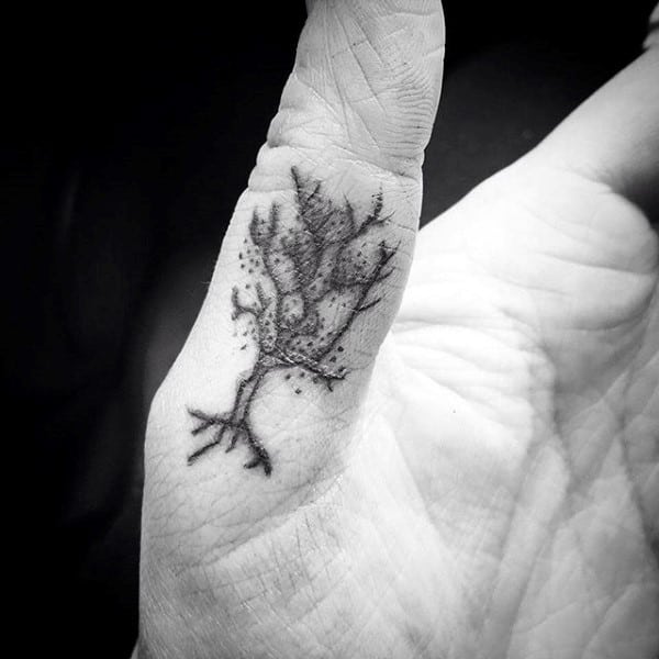 Guy With Tree Thumb Tattoo