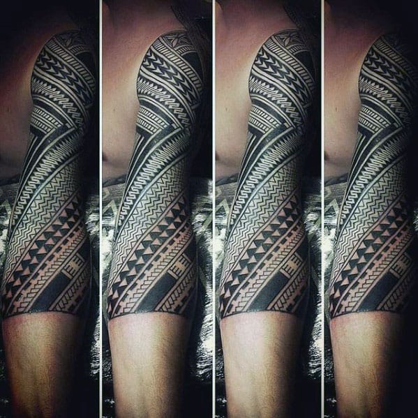 Guy With Tribal Polynesian Half Sleeve Tattoo