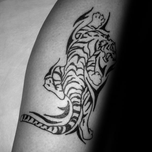Guy With Tribal Tiger Tattoo On Leg