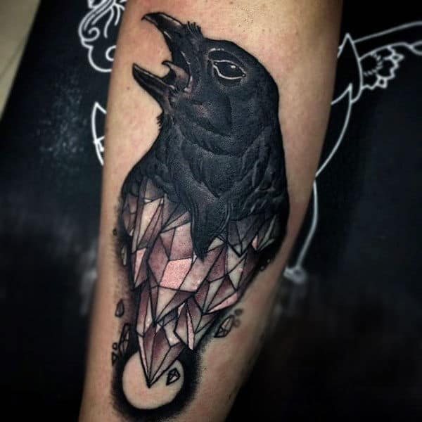 Guy With Unique Raven On Sharp Edged Gems Tattoo Forearm