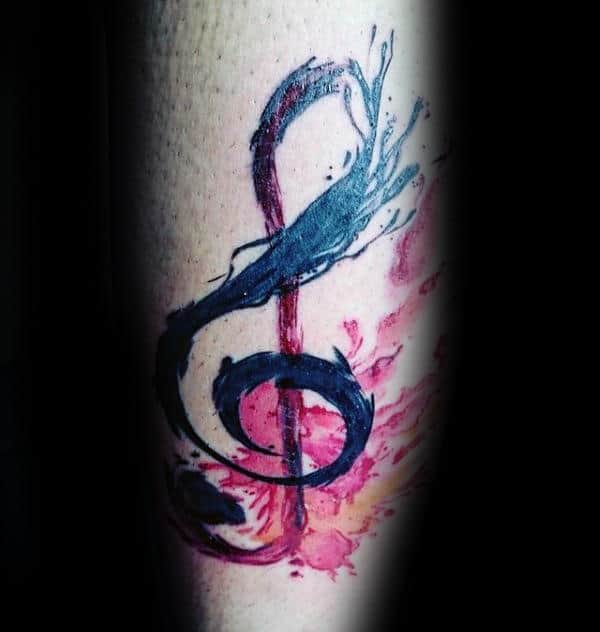 Guy With Watercolor Music Note Tattoo On Arm