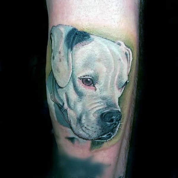 Guy With White Ink Dog Tattoo On Outer Arm