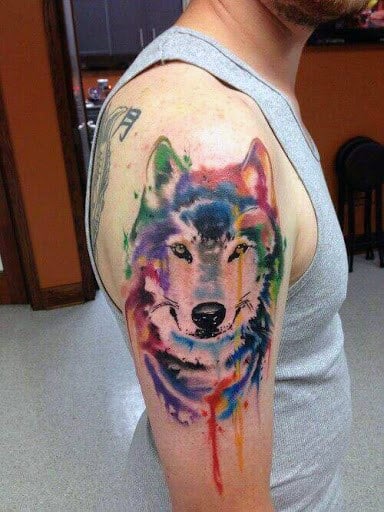 Guy With Wild Animal Watercolor Tattoo On Arms