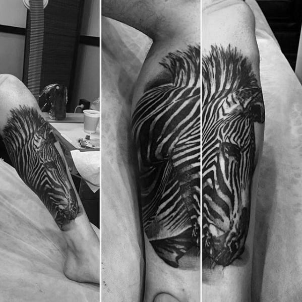 Guy With Zebra Leg Sleeve Tattoo