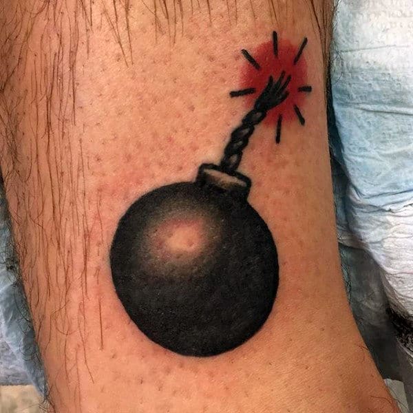 Guys Arms Tiny Bomb Tattoo