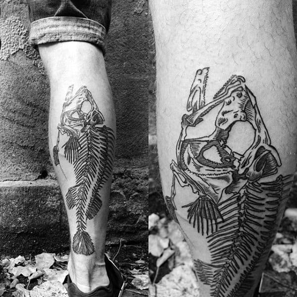 Guys Back Of Leg Fish Skeleton Tattoo Inspiration