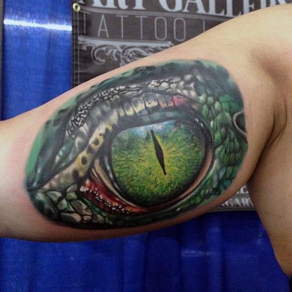 Guys Bicep Arms Alligator Eye Tattoo