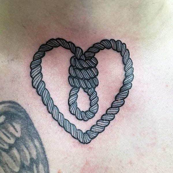 Guys Chest Heart Shaped Rope Tattoo