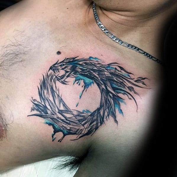guys-circular-watercolor-small-upper-chest-dragon-tattoo