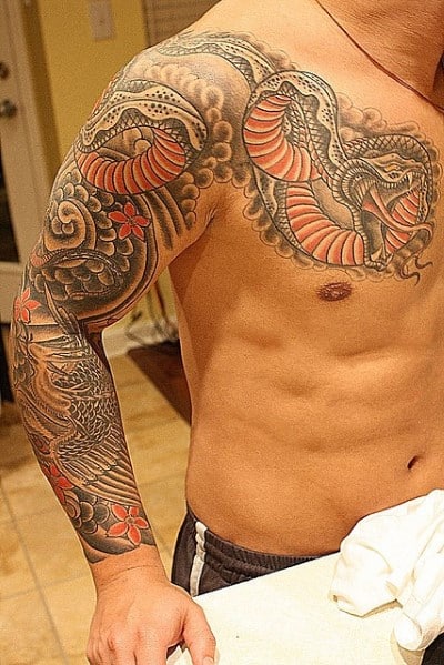 Guy's Dragon Tattoo On Shoulder Area