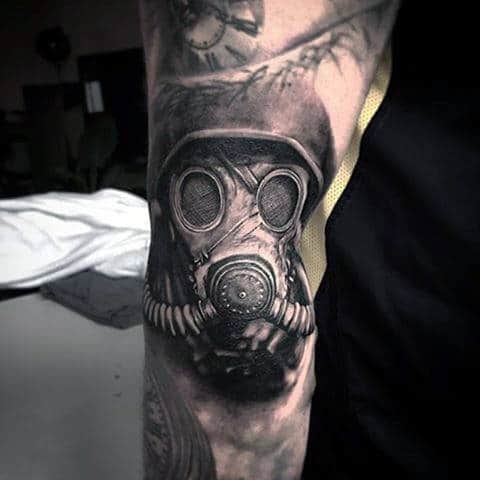 Guys Elbow Tattoo Of Gask Mask