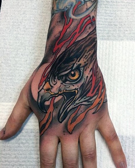 Guys Fire Hawk Hand Tattoos