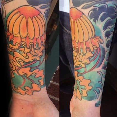 Guys Forearms Carrot Colored Jellyfish Tatto