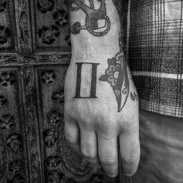 Guys Gemini Zodiac Sign Tattoo On Hand
