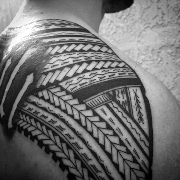 Guy's Hawaiian Tattoo On Back