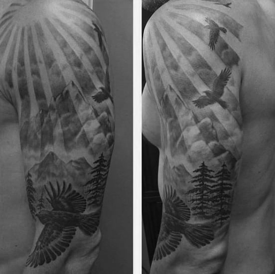 Guys Hawk Tree Sleeve Tattoo With Rising Sun Rays