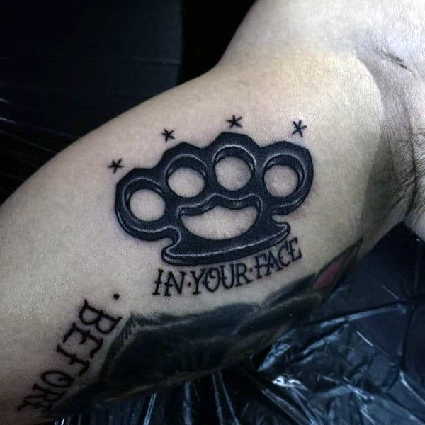 Guys In Your Face Inner Arm Bicep Brass Knuckles Black Ink Tattoo