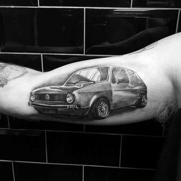 Guys Inner Arm Bicep Tattoos With Volkswagen Wv Design