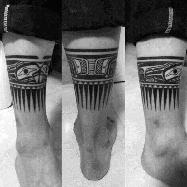 Guys Legs Black Spiky Haida Tattoo