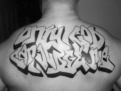 guys negative space only god can judge me graffiti design upper back tattoo