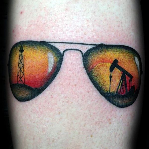 Guys Oilfield Tattoo Design On Sunglasses With Sunset And Pumpjacks