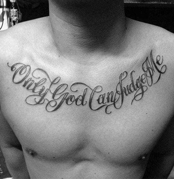 guys only god can judge me traditional script font tattoo on chest