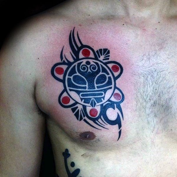 Guys Red And Black Ink Taino Sun Chest Tattoos