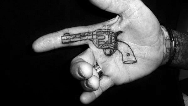 Guys Simple Hand Revolver Palm Tattoo Design Idea Inspiration
