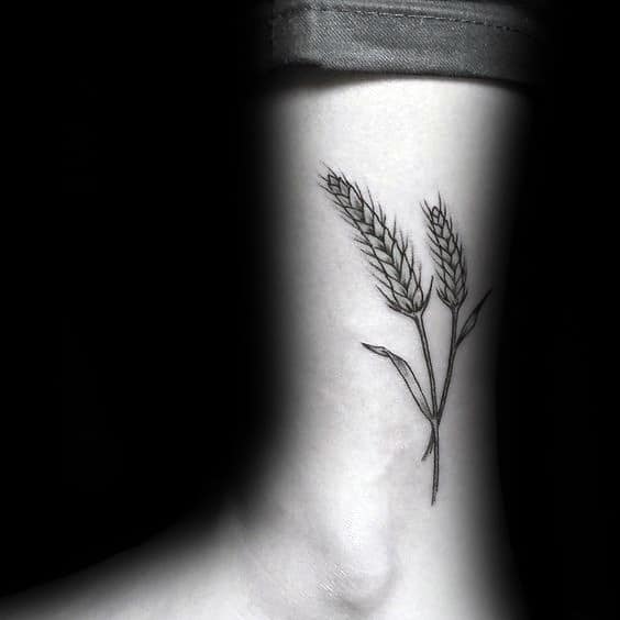 Guys Small Wheat Tattoo On Lower Leg Above Ankle