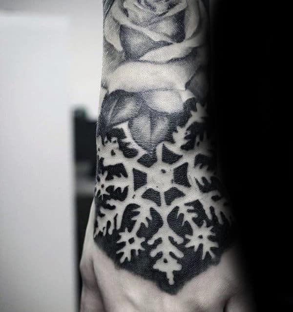 Guys Snowflake Negative Space Hand Tattoo