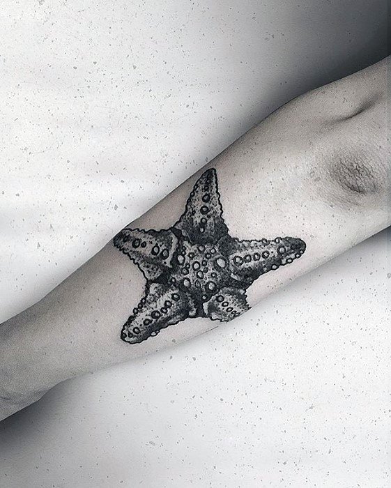 Guys Starfish Tattoos On Outer Forearm